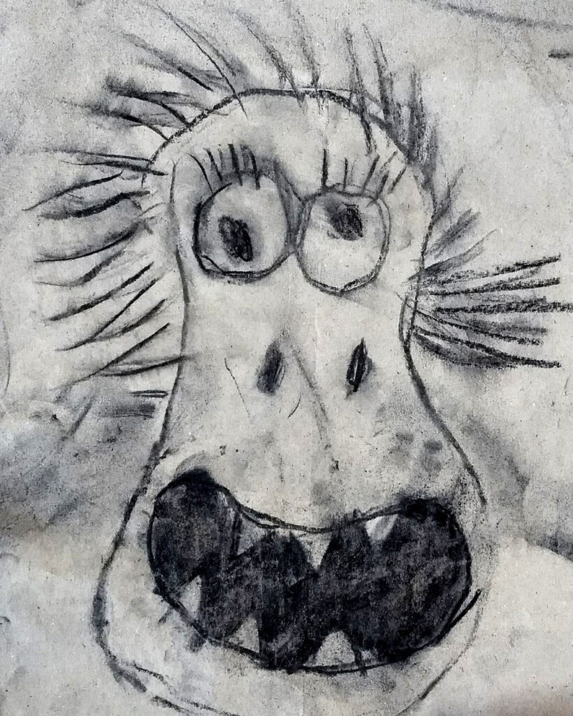 Beispiel für ein Monster als Kohlezeichnung aus der Grundschule